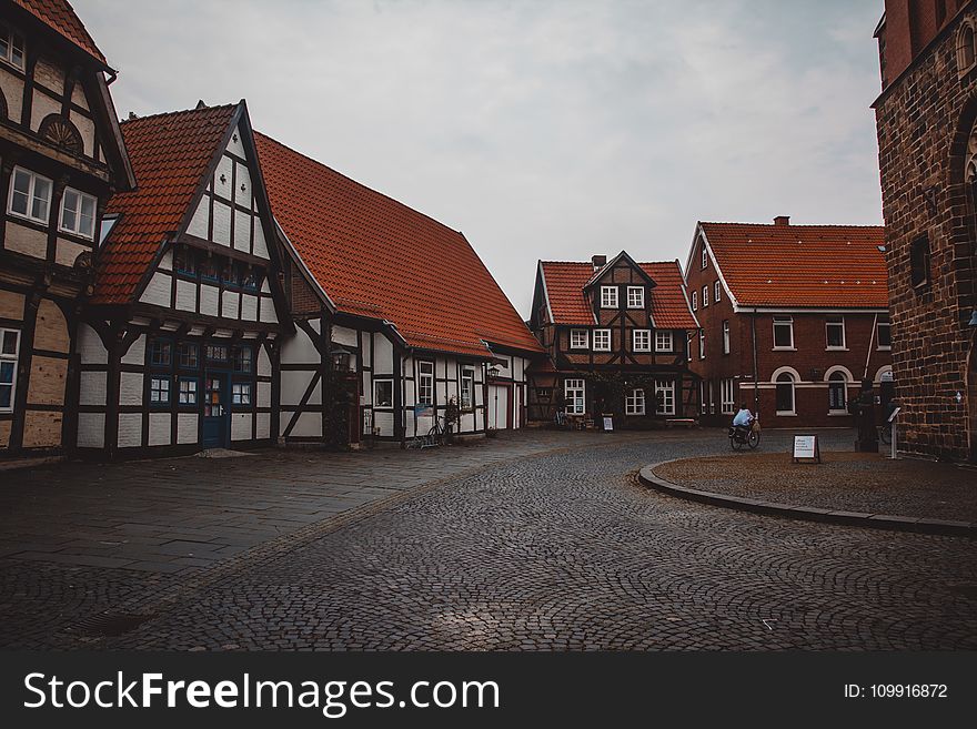 Brown and White Wooden Houses