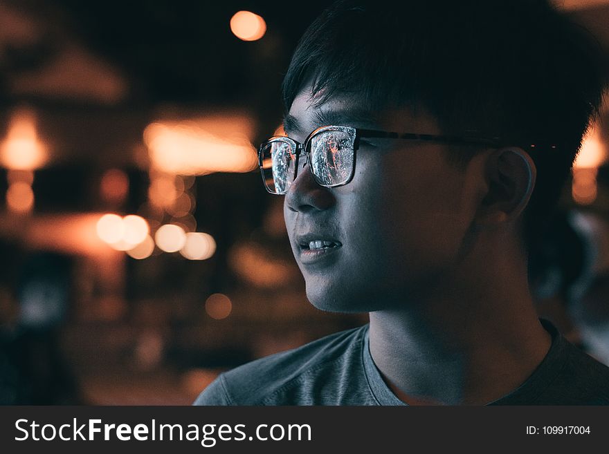 Man In Gray Shirt Wearing Eyeglasses