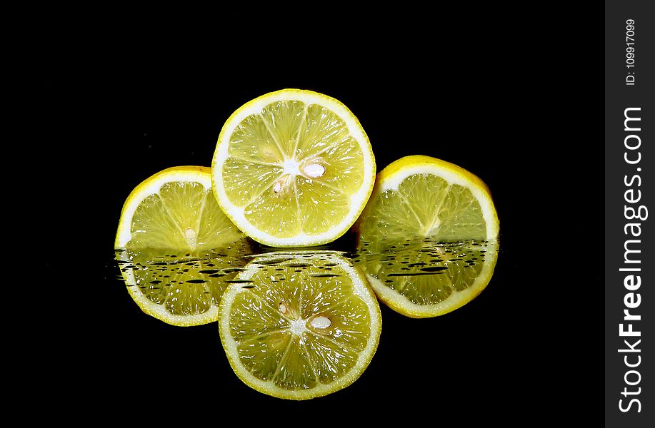 Three Sliced Lemons