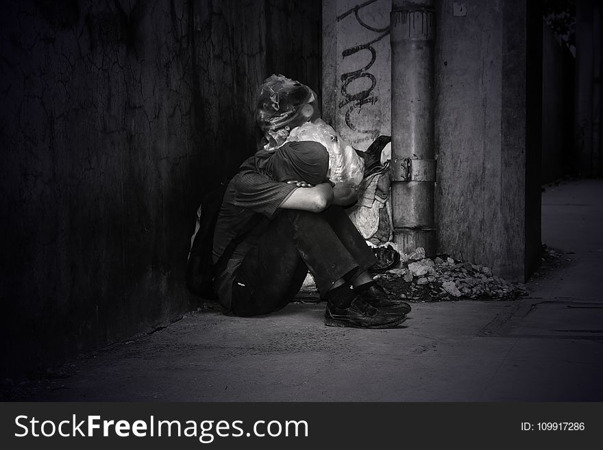 Monochrome Photo Of A Homeless Man