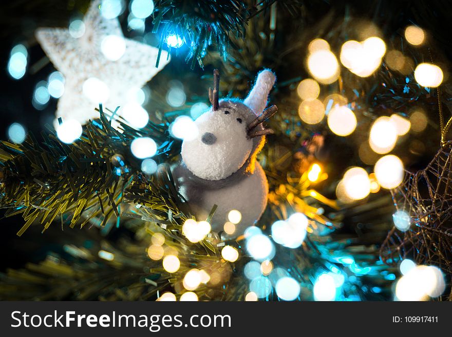 Macro Shift Photography of White Deer Ornament