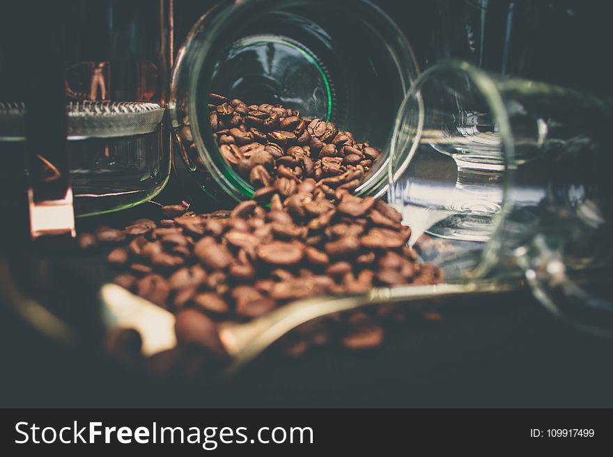 Coffee Beans In Clear Glasses