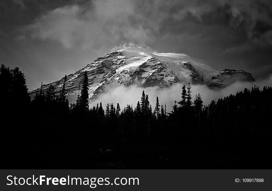 Grayscale Photo Of A Mountain Covered With Snow