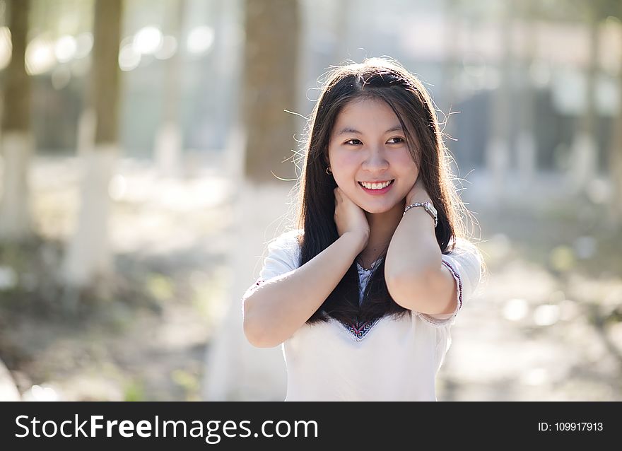 Close-Up Photography of Asian Woman Smiling