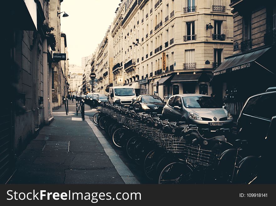 Photography of Parked Bicycles Near Buildings