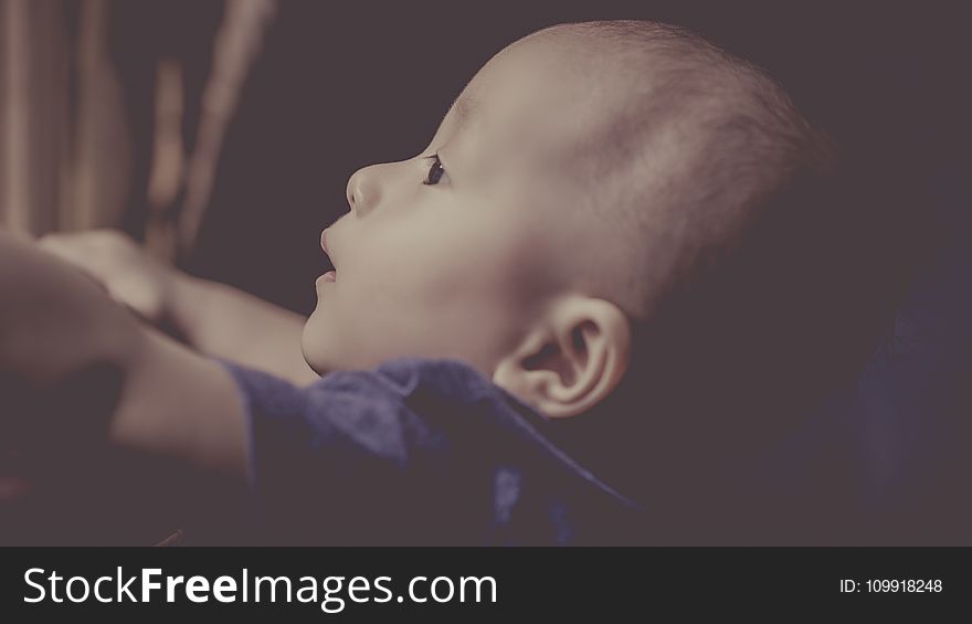 Baby Wearing Blue Shirt