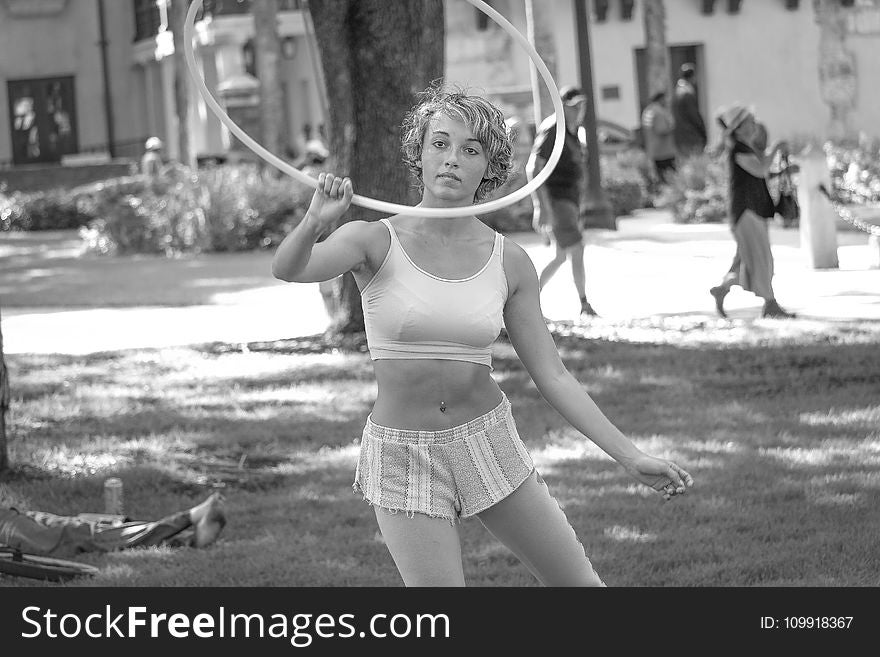 Woman In White Sports Bra And Shorts Holding Hoop