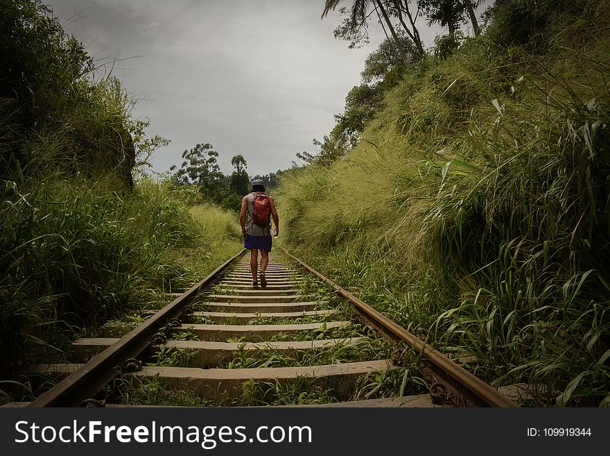 Man Walking In Train Railroad