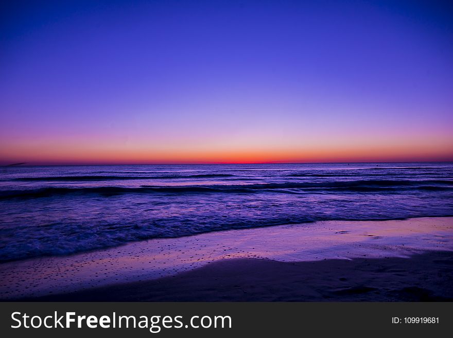 Scenic View Of Ocean During Dawn