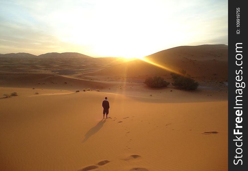 Photo Of Man On The Dessert During Daylight