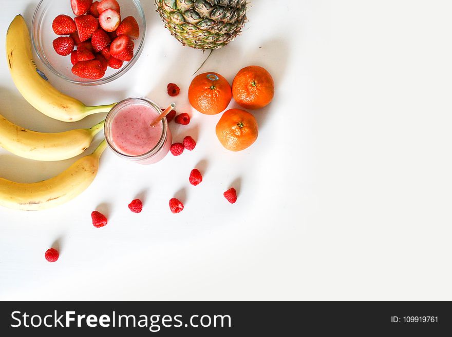 Assorted Fruits On White Surface