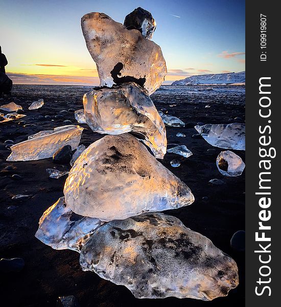 Close Up Photo of Ice Stone on the Ground