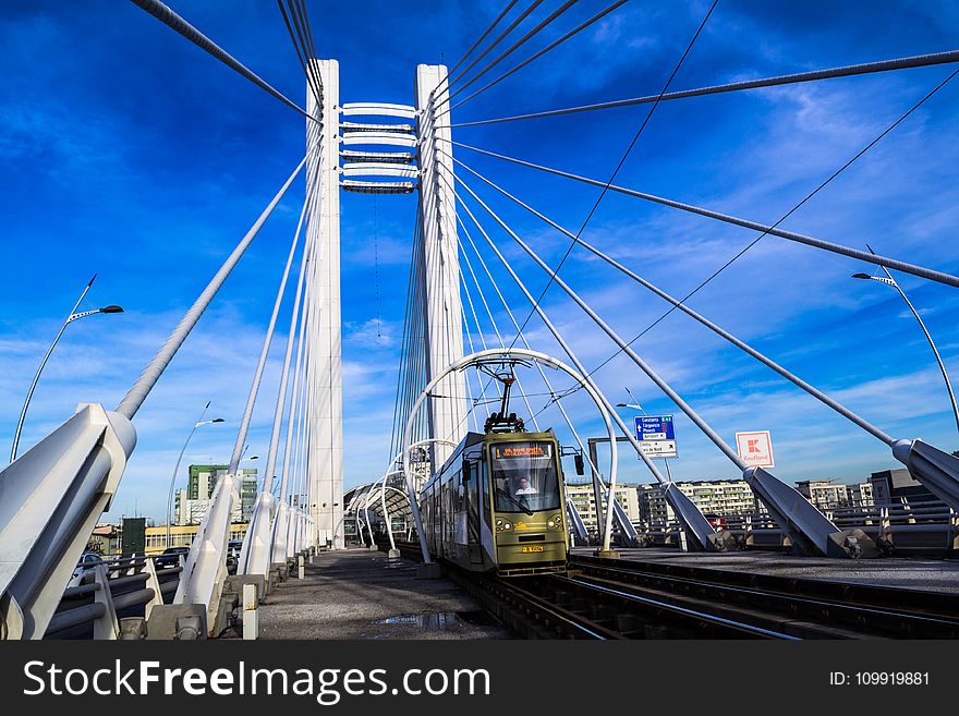 Bridge With Train Under Blue Sky