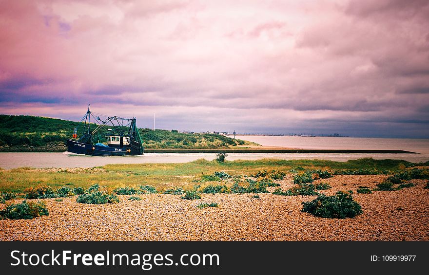 Black Galleon Ship on River Photo