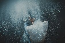 Free Topless Man Showering With White Powders Stock Photo - 109926190