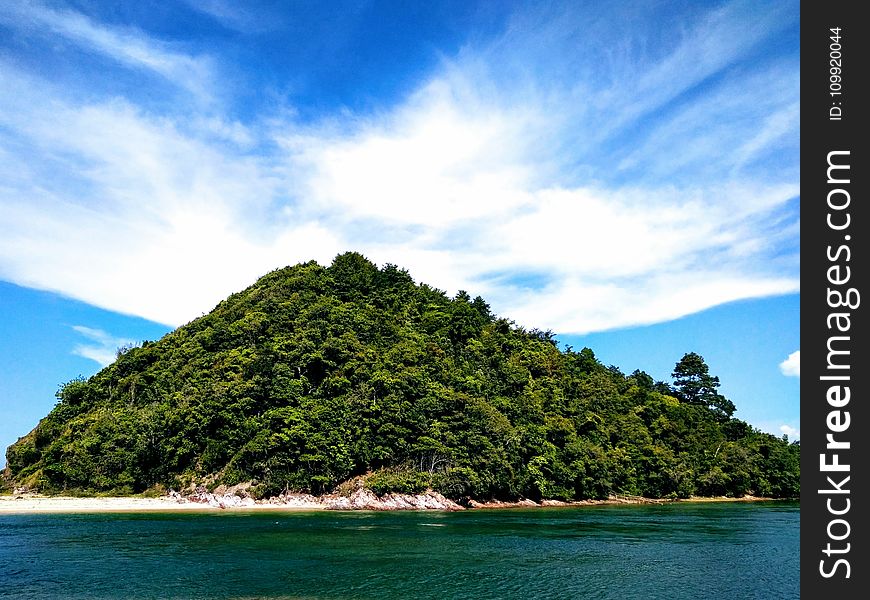 Green Mountain Under Blue Sky