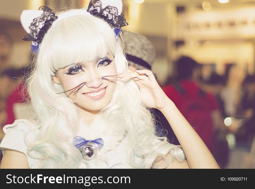 Woman Wearing White Anime Character Costume