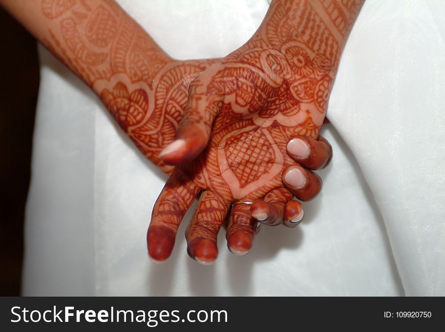 Close-up Photo of Person With Henna Tattoo