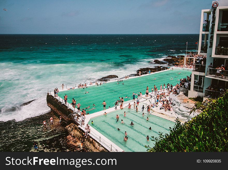 People Gathering Near Swimming Pool