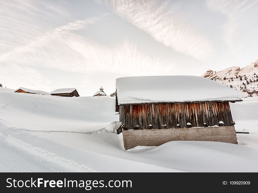 Photo of Concrete Houses Covered With Snow