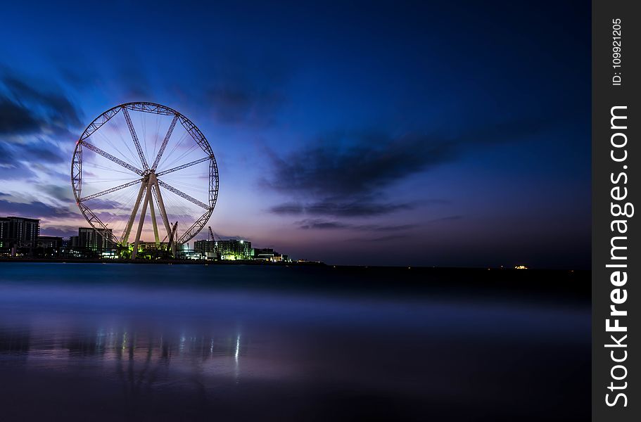 Photography Of Ferris Wheel Near Body Of Water