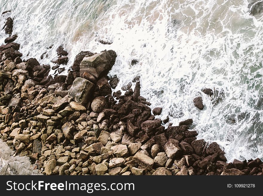 Brown Rocks On Shore