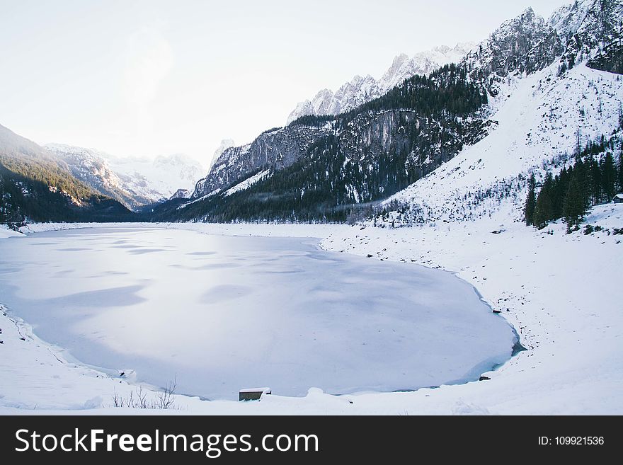 Landscape Photo of Lake Surrounded With Snow