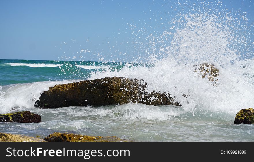 Photography of Sea Waves Under Blue Sky