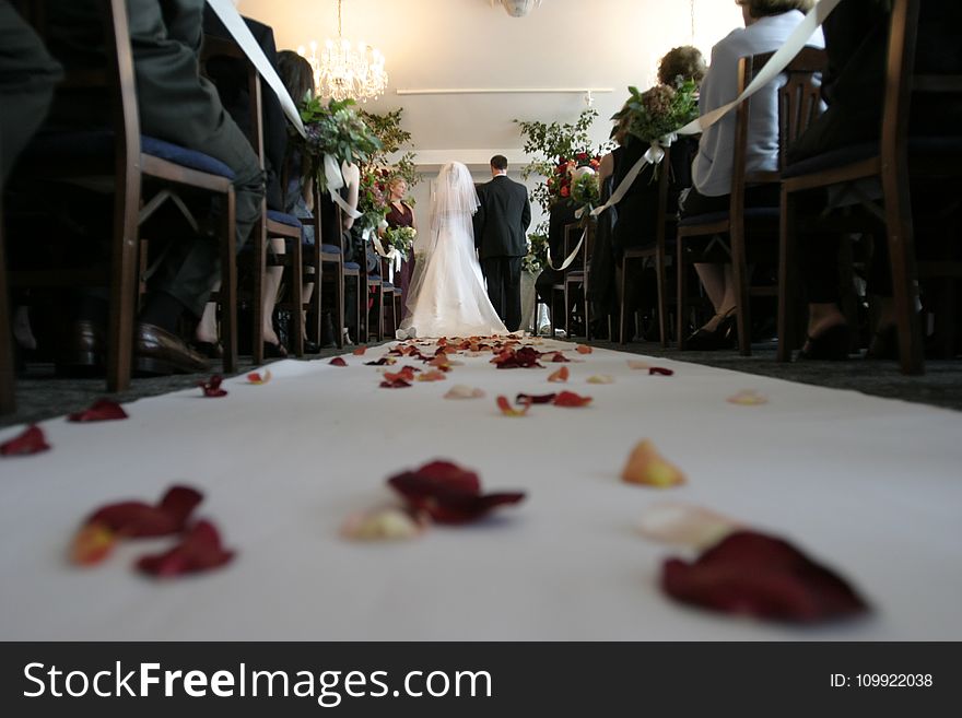 Bride And Groom Walking Down The Aisle