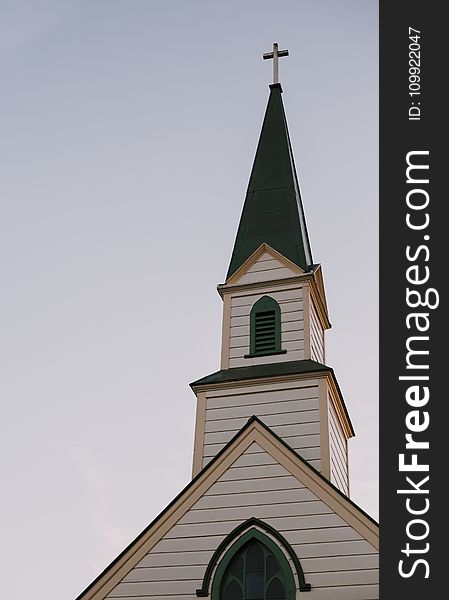 Architectural Photography of White and Green Church Bell Tower Under Clear Sky