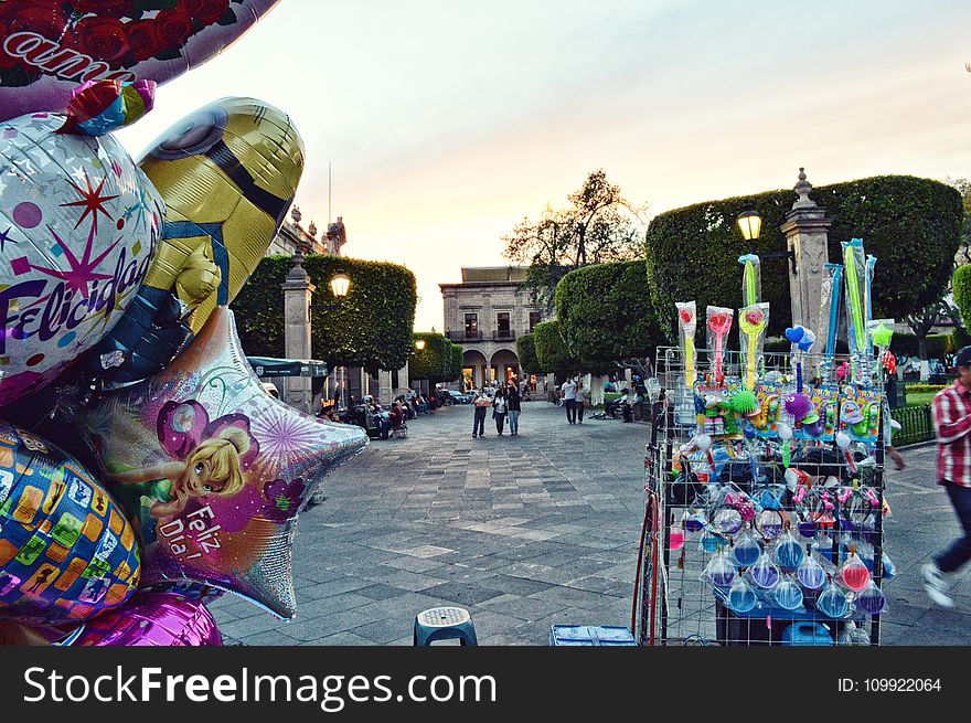 Photo Of Balloons And Souvenir On Street