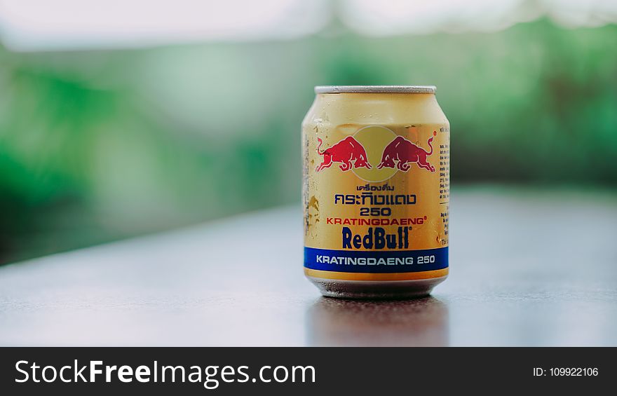 Close-up Photography of Red Bull in Can