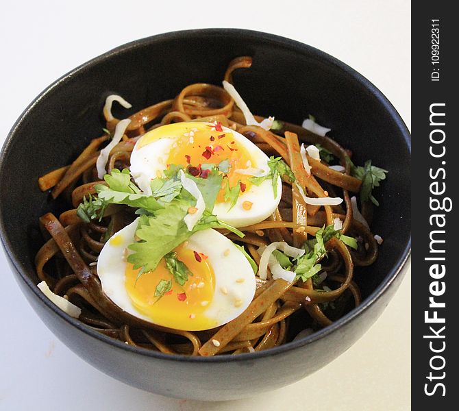 Bowl Filled With Noodles And Hard Boiled Egg