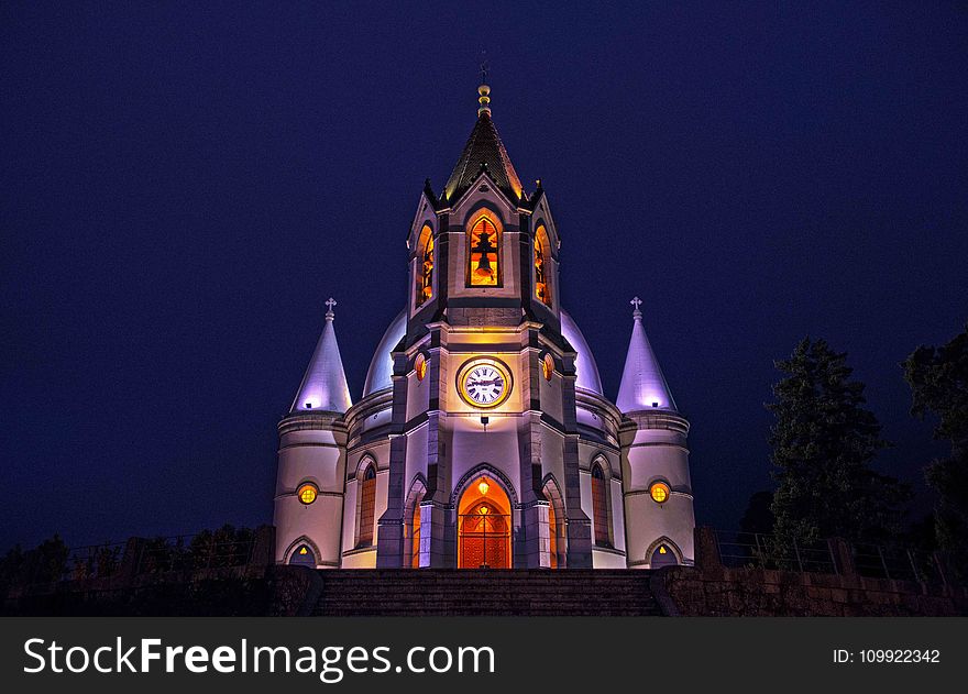 Gray and White Concrete Cathedral With Lights Photo