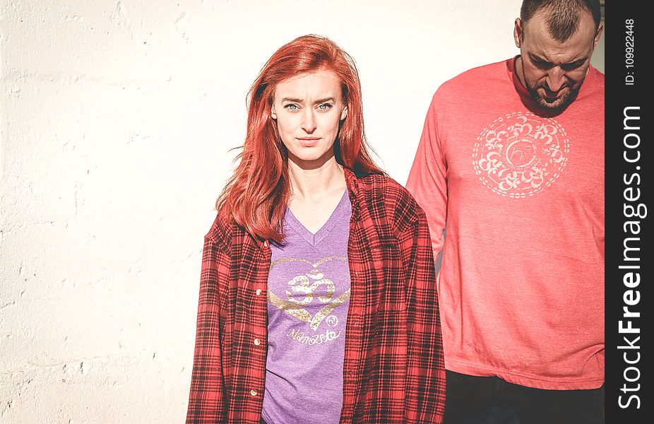 Woman Wearing Red and Gray Plaid Sports Shirt