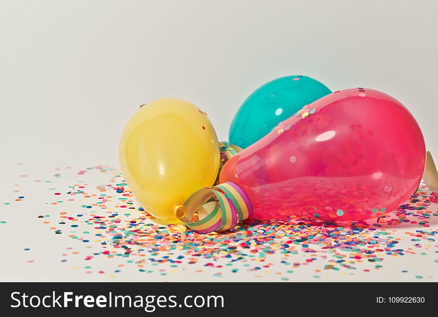 Yellow, Pink, and Blue Party Balloons