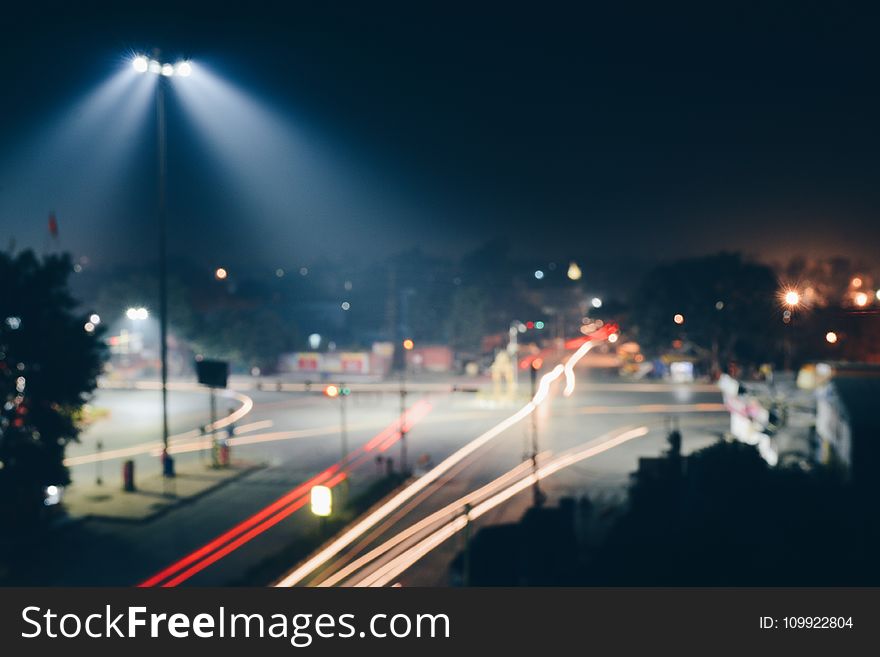 Time Lapse Photo Of Road With Red And Yellow Lights