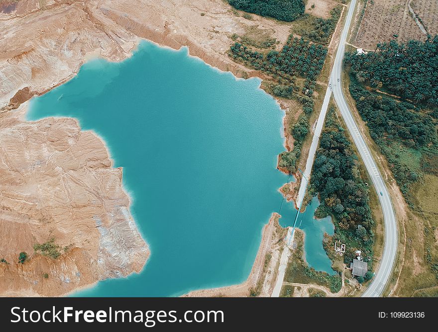 Aerial Photo of Lake Near Highway