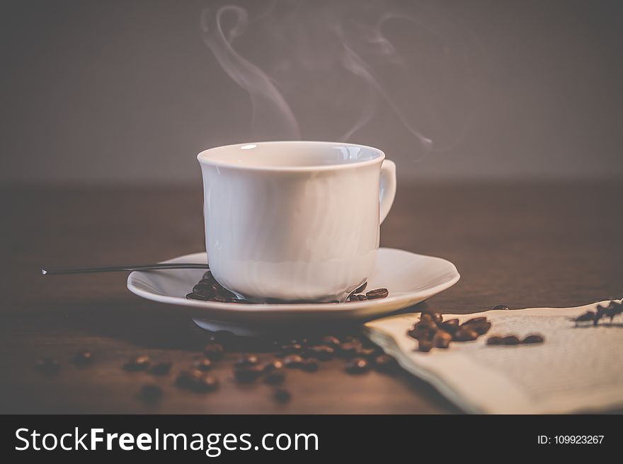 White Ceramic Coffee Mug With Saucer