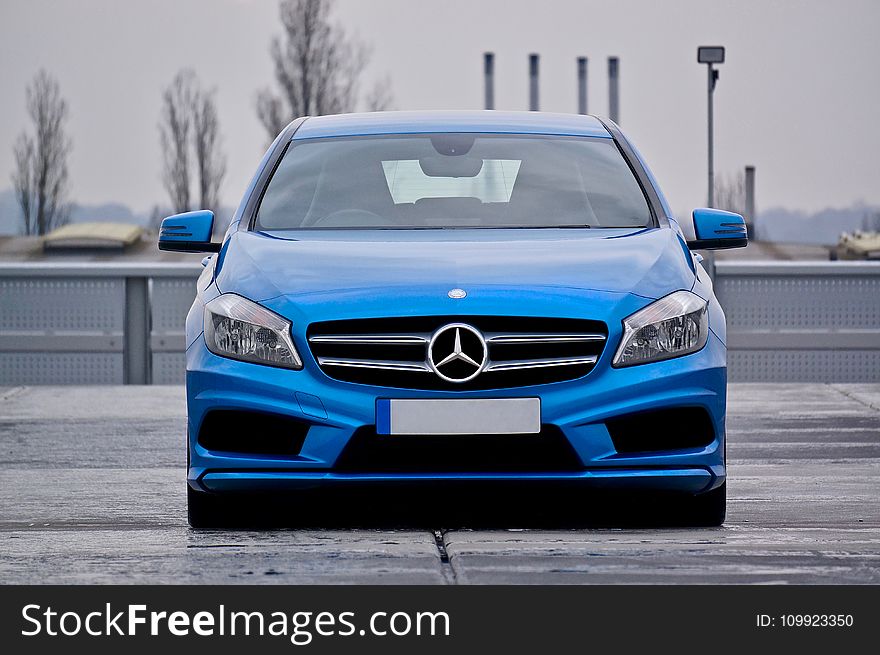 Blue Mercedes Benz Car Parked