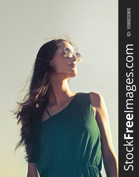 Photography of a Woman Wearing Sunglasses