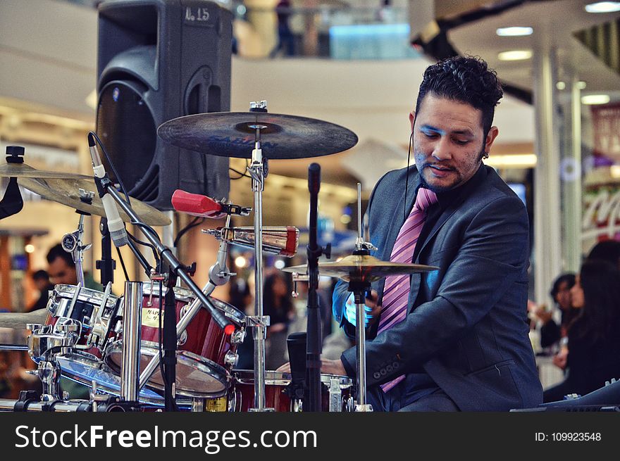 Man Playing Drum Inside Mall