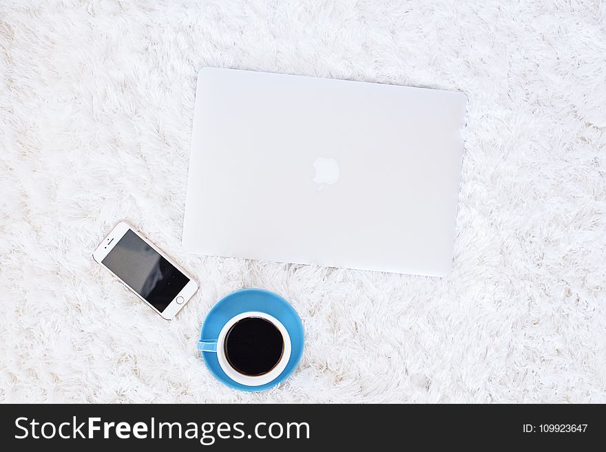Flat Lay Photography of Apple Devices Near Cup of Coffee