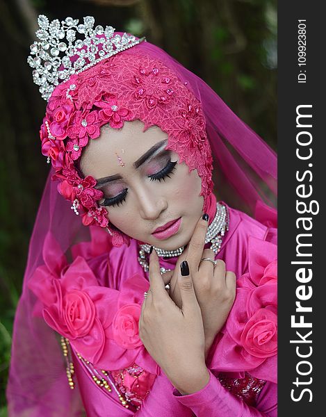 Woman In Pink Traditional Dress Wearing A Tiara