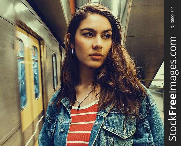 Photo Of A Woman Wearing Blue Denim Jacket