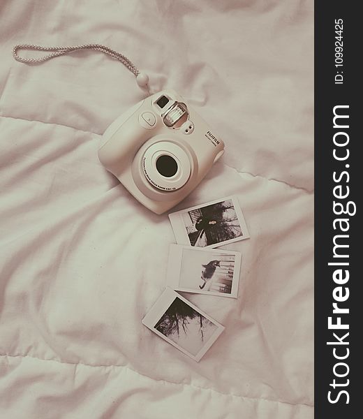 Photo of White Fujifilm Instax Camera