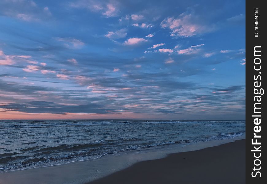 Scenic View of Ocean During Dawn