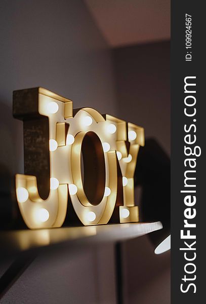 Selective Focus Photography Of Joy Free Standing Letters With Lights