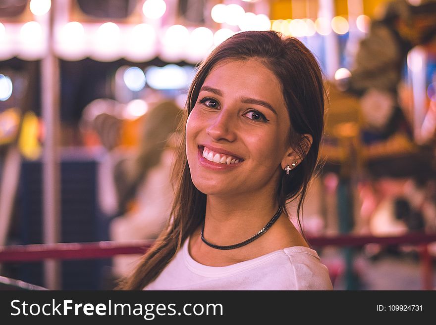 Close-Up Photography of a Woman Smiling