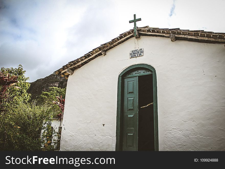 Photo Of Church Near Tree